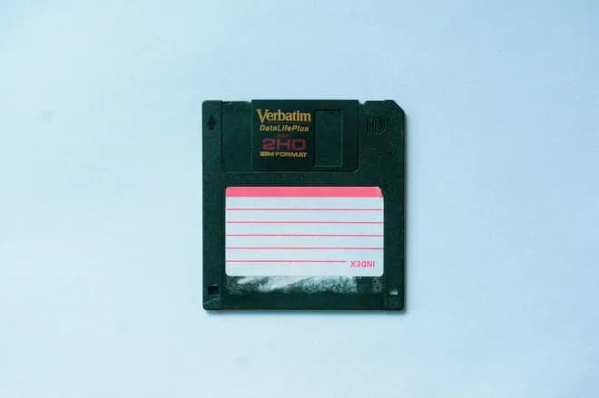 A retro floppy disk — your memory.
